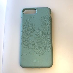 A turquoise, coral reef design iPhone 8 Plus case.